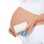 беременная держит таблетки от дисбактериоза