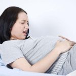 Болит живот во время беременности 2 триместр