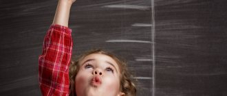 girl reaches out with her hand to the last division of the height scale
