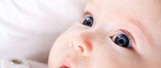 How does a newborn baby see in the first month?