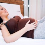 Why does the ovary hurt in early pregnancy?