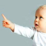 Child pointing with finger